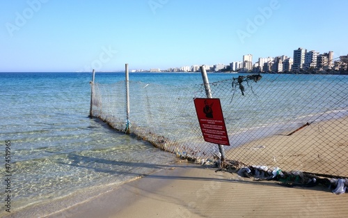 Varosha, once famous beach resort destination is now spooky ghost town, now only with few tourist and restricted beach .12.07.2021 Famagusta, Northern Cyprus photo