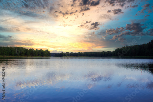 Fototapeta Naklejka Na Ścianę i Meble -  Beautiful nature. Dramatic sunset over the lake in Lithuania