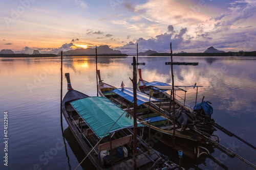 Ban Sam Chong Tai and colorful sunrises that emerges behind the giant limestone mountains, Thailand