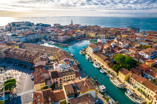 Town of Grado colorful architecture and channels aerial view, Friuli-Venezia Giulia photo