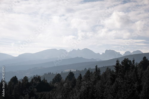 Silhouette of The Sleeping Giant peaks on Rila mountain under a cloudy, blue sky