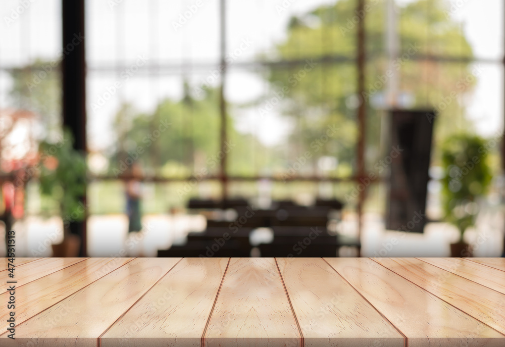 Empty wooden tabletop with lights bokeh on blur restaurant background. Empty wooden tabletop with lights bokeh on blur restaurant background.