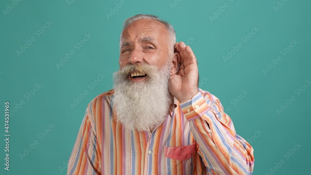Middle aged man health ear trouble deafness isolated cyan color background