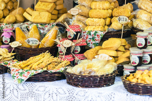 Traditional polish smoked cheese "oscypek" at a Christmas Market stall in Krakow, Poland.