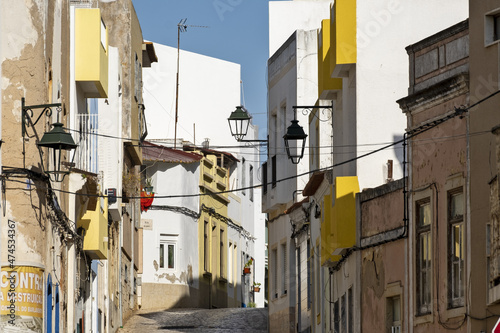Fototapeta Naklejka Na Ścianę i Meble -  street and houses in the old town of  in Portimao, Algarve, Portugal	