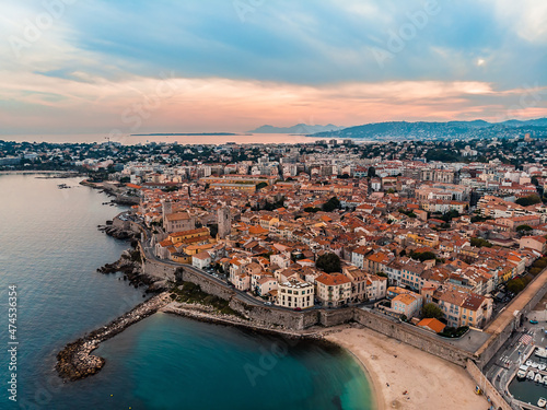 Drone shot of the old city of Antibes. Cote d'Azur of the Mediterranean Sea of ​​France. Resort on the French Riviera Antibes. Picasso Museum. View from the drone yachts moored in the city marina. © Сергей Иванович