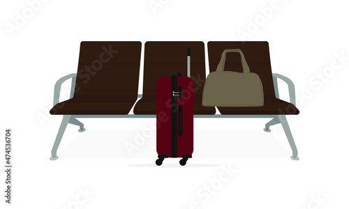Bag and suitcase on wheels near the seats on a white background photo