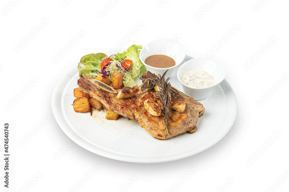 Grilled steak pork chop with boiled potatoes and vegetable salad Grilled steak pork chop with boiled potatoes and vegetable salad