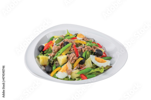 Tuna salad with boiled egg, tomato, lettuce, corn and red onion. Healthy and detox food concept. Ketogenic diet. Fresh vegetable salad bowl on white background. Banner