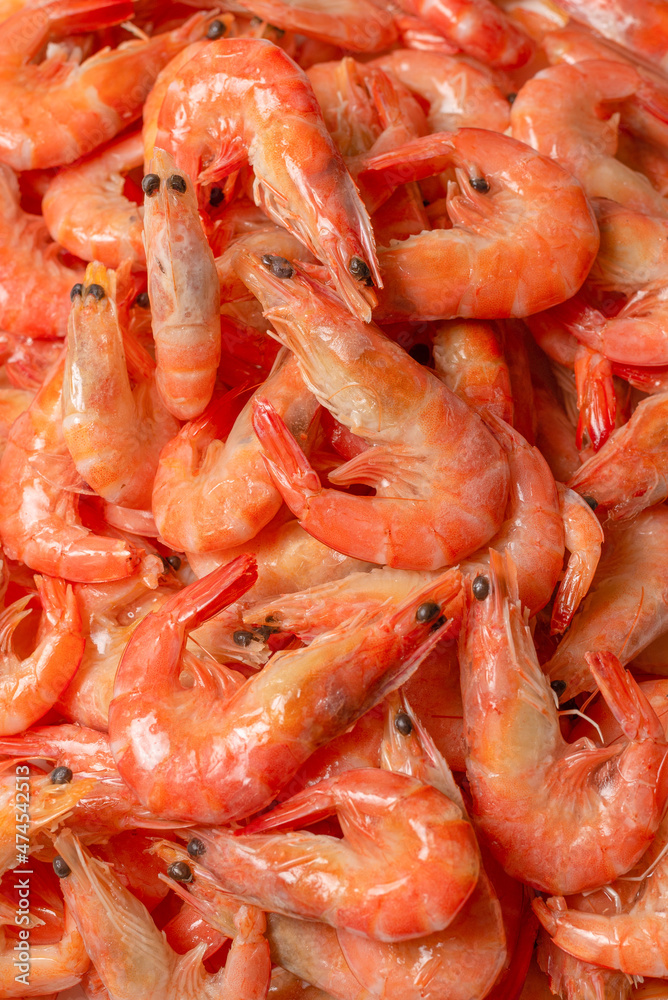 Shrimps background texture. A lot of shrimps. Cooked shrimps. Shrimps background texture. A lot of shrimps. Cooked shrimps.