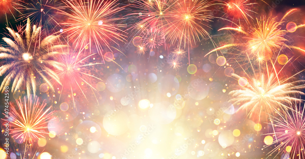 Fototapeta premium Fireworks With Golden Lights - Anniversary Celebration In Night With Abstract Defocused Bokeh