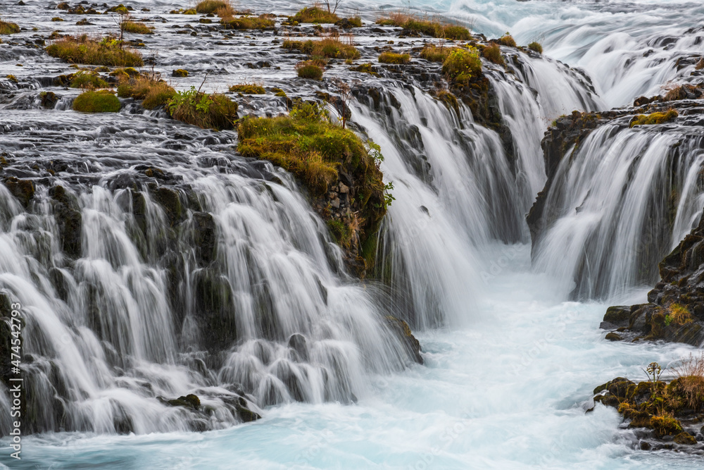 Picturesque waterfall Bruarfoss autumn view. Season changing in southern Highlands of Iceland.