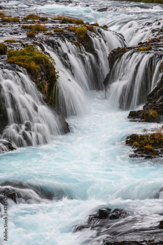 Picturesque waterfall Bruarfoss autumn view. Season changing in southern Highlands of Iceland.