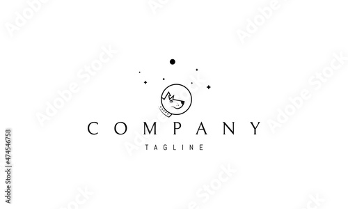 Vector logo in which an abstract image of a funny dog in a spacesuit on a background of stars.