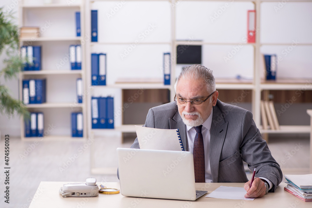 Old male employee and too much work in the office