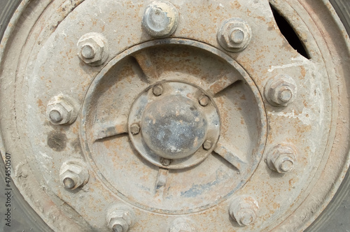 close-up - a large wheel with bolts from a heavy truck