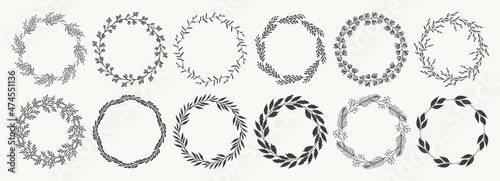 Set of floral round frames. Vintage plant wreaths with leaves and branches. Laurel wreaths. Decorative hand drawn elements for design