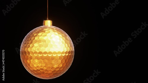 Realistic looping 3D animation of the hanging spinning golden golf ball as Christmas decoration rendered in UHD with alpha matte