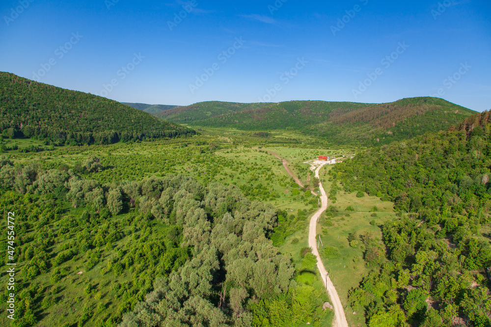 The road among the mountains of the Zhigulevsky reserve. Aerial photo. Samara, Russia.