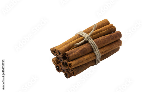 cinnamon sticks tied by rope isolated on white background, healthy eating, copy space, horizontal