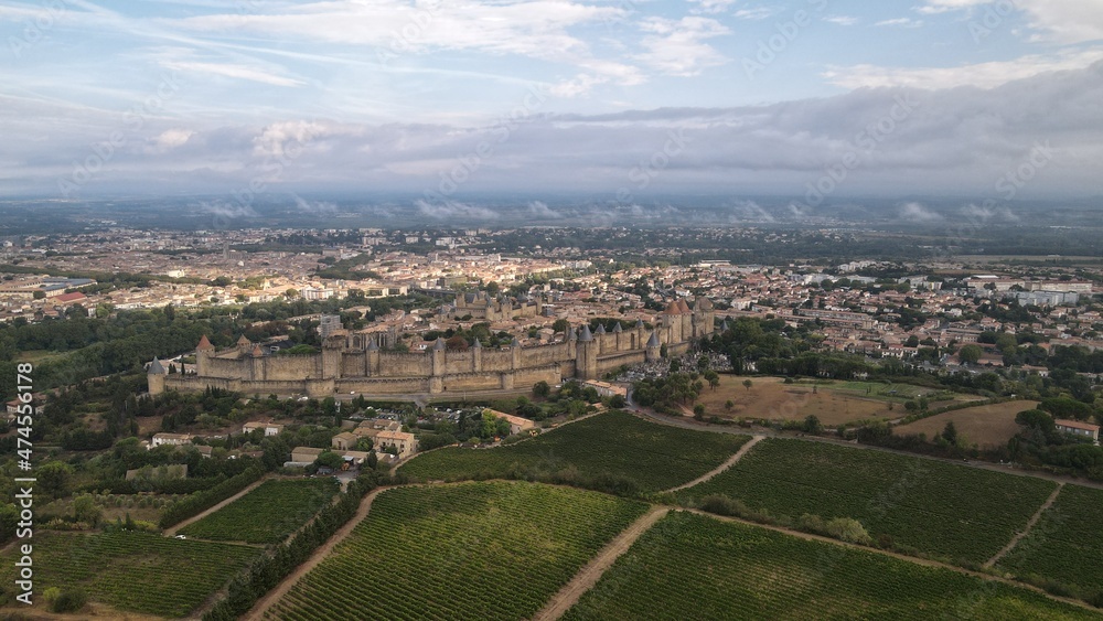 Carcassonne, a hilltop town in southern France’s Languedoc area, is famous for its medieval citadel, La Cité, with numerous watchtowers and double-walled fortifications.