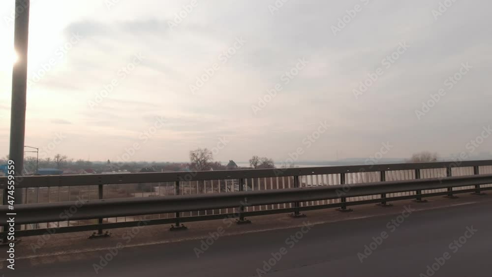 River and houses view from car evening autumn sky River and houses view from car evening autumn sky