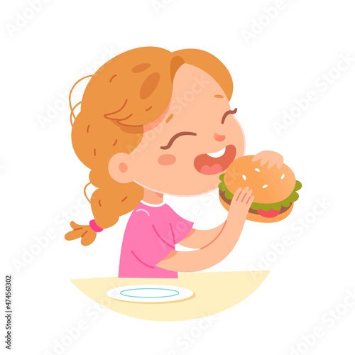 Hungry kid eating fastfood hamburger, enjoying unhealthy food, girl sitting at table