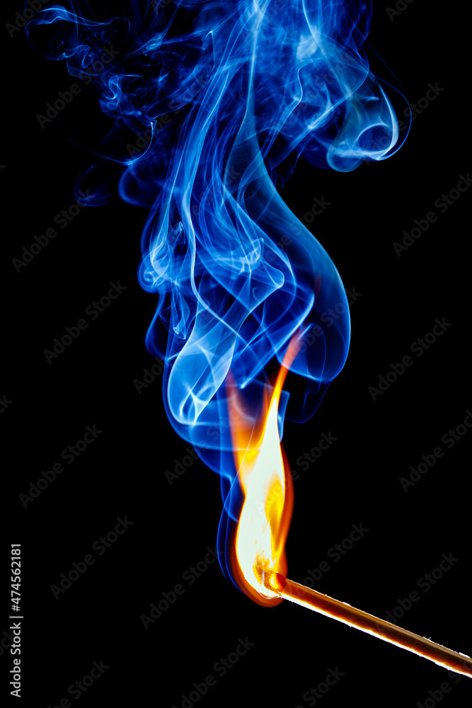 flame and smoke of a matchstick on black background flame and smoke of a matchstick on black background