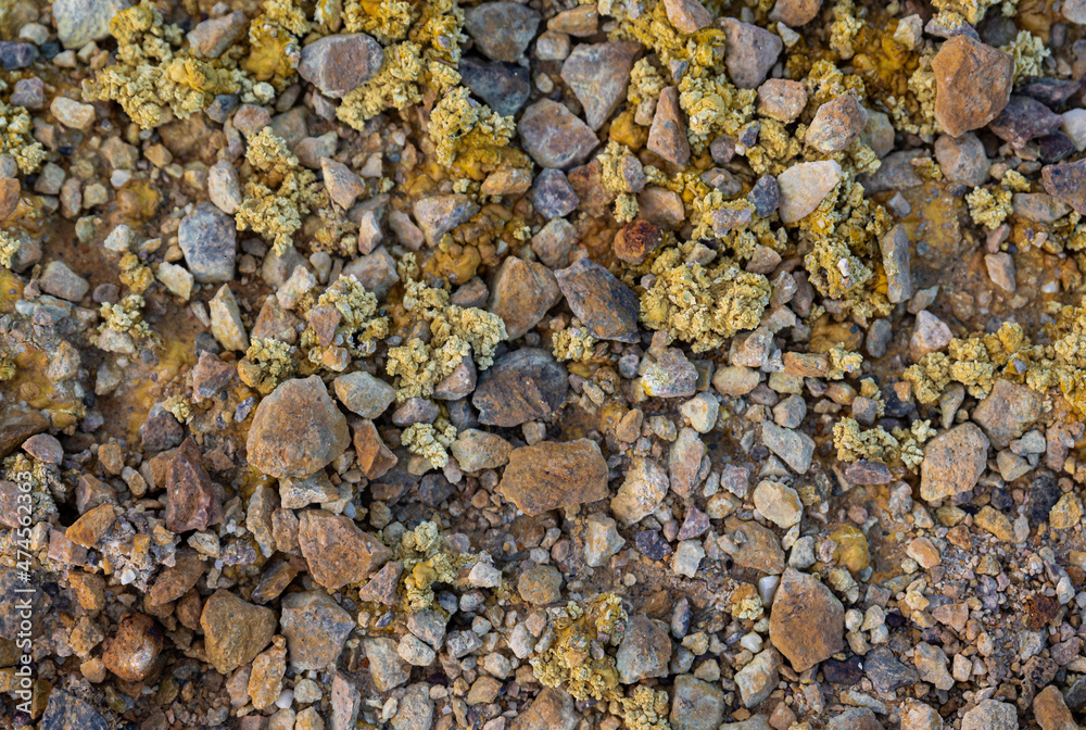 Sulphur crystals in mineral soil close up Sulphur crystals in mineral soil close up