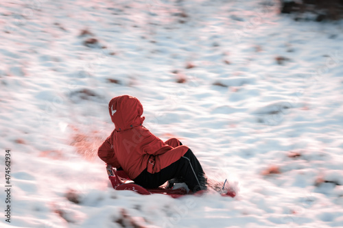 boy sledding © Miroslav Bakoš
