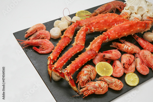 scallops, shrimp, crab legs and lemons