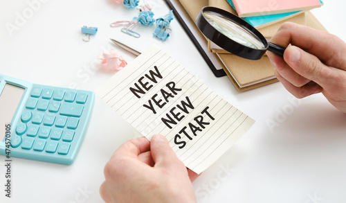 New year new start text in hand mail on white background.