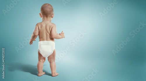 Newborn in the diaper. Isolated	baby.