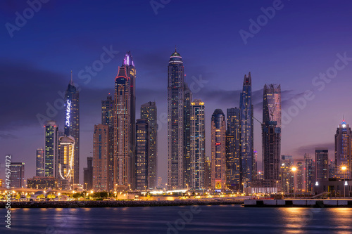 Sunset view of Dubai Marina and famous Jumeirah beach skyline Emirates
