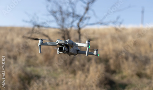 close up photo of flying drone with digital camera