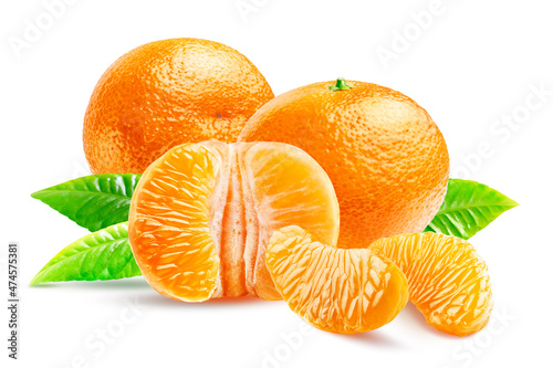 Composition of two tangerines, peeled halves, two peeled cloves and leaves isolated on a white background.