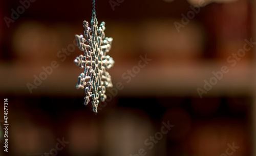 Iron snowflake as a decoration on the Christmas tree