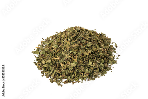 Dried Lemon balm (Melissa officinalis) herb heap isolated on white background.