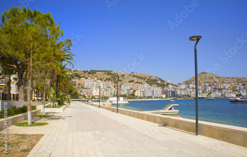 City embankment with modern sculptures in a sunny summer day in Saranda, Albania