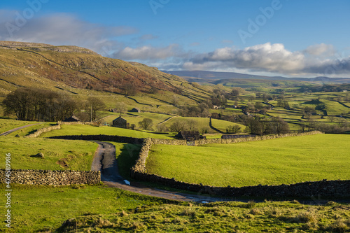 Hill walking the Norber Eratics around Austwick in Craven in  the Yorkshire Dales photo