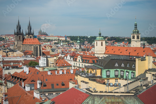 Cityscape of Prague and many of it's famous buildings such as the Church of Our Lady before Týn and Prague Castle from a viewpoint at the Powder Tower - Prague, Czech Republic