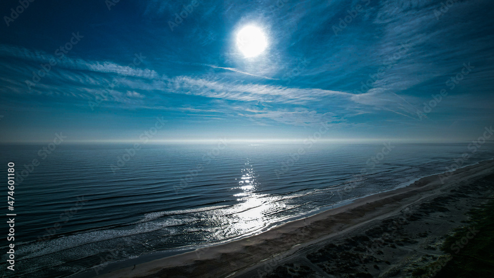 Aerial drone view of morning sunrise off a beach in St Augustine Florida during the December season high tide