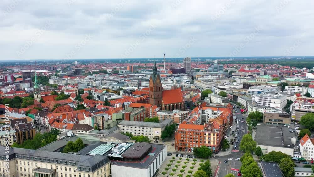 Slow forward flight over town of Hanover during sunny day with clouds - Old historic buildings and church in central city Slow forward flight over town of Hanover during sunny day with clouds - Old historic buildings and church in central city
