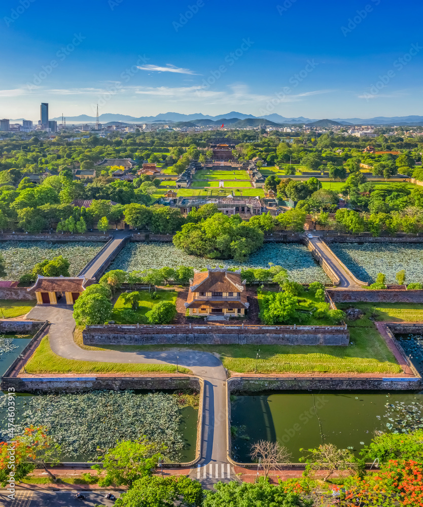 Obraz premium Wonderful view of the “ Gate of Hue Citadel “ to the Imperial City with the Purple Forbidden City within the Citadel in Hue, Vietnam. Imperial Royal Palace of Nguyen dynasty in Hue. Hoa Binh gate