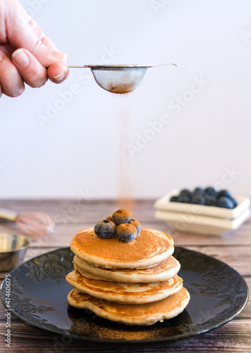 pancakes on a black plate