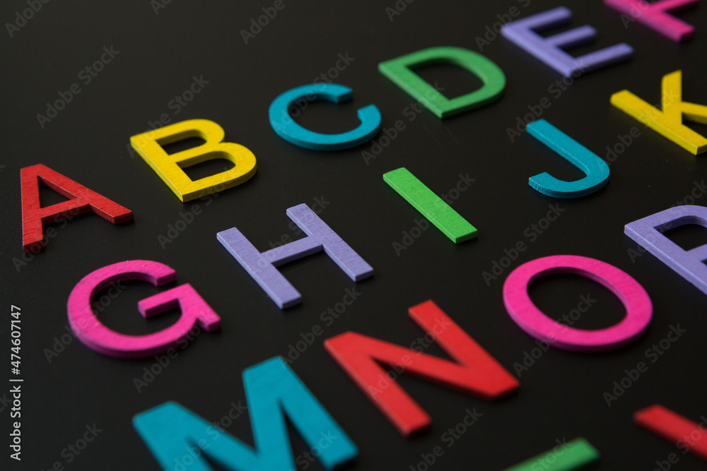Colorful wooden english letters A-Z on black background Colorful wooden english letters A-Z on black background