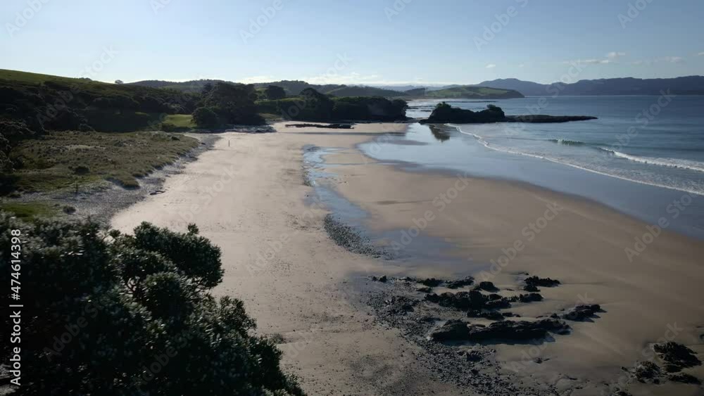 Picturesque And Quiet Beach In Tawharanui Regional Park In New Zealand - aerial shot Picturesque And Quiet Beach In Tawharanui Regional Park In New Zealand - aerial shot