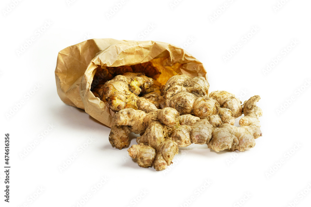 Fresh ginger on white background,raw material for cooking Fresh ginger on white background,raw material for cooking