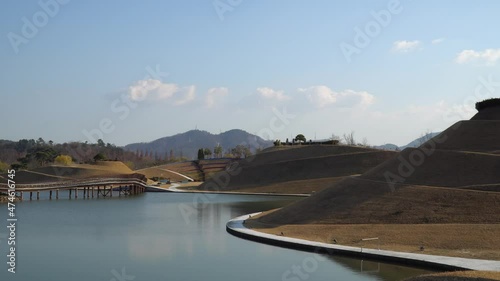 The magnificent Lake Garden in  Suncheon Bay National Park with Bridge of Dreams - static landscape on Autumn day photo