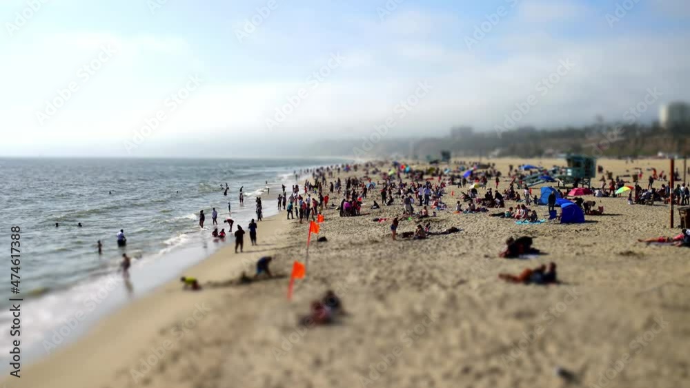 Miniature Timelapse of Santa Monica Pier beach in California.
Light cloudy day, people playing on the beach. Miniature Timelapse of Santa Monica Pier beach in California.
Light cloudy day, people playing on the beach.